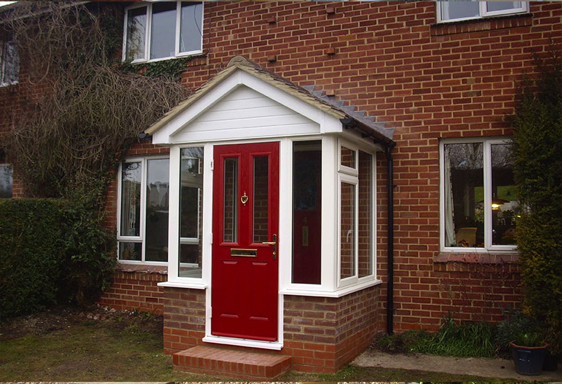 uPVC Porch with Red Composite Door